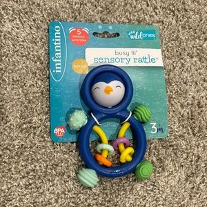 Brand new Infantino busy lil sensory rattle penguin - 3 months +